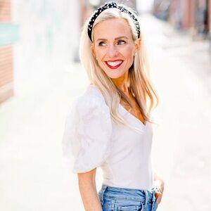 White bodysuit. Tags still on!